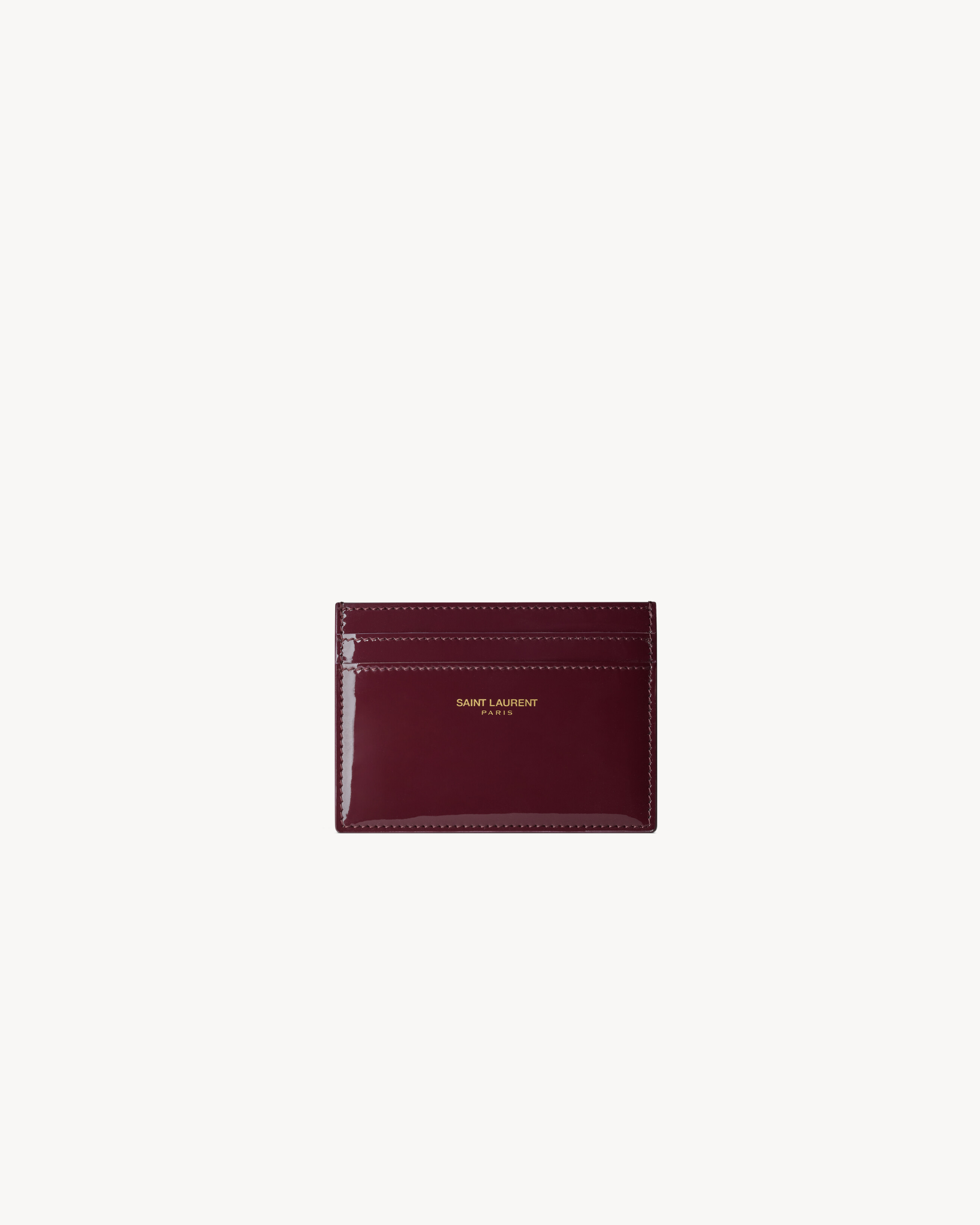 Визитница SAINT LAURENT PARIS из лакированной кожи, бордо
Визитница SAINT LAURENT PARIS из лакированной кожи, бордо