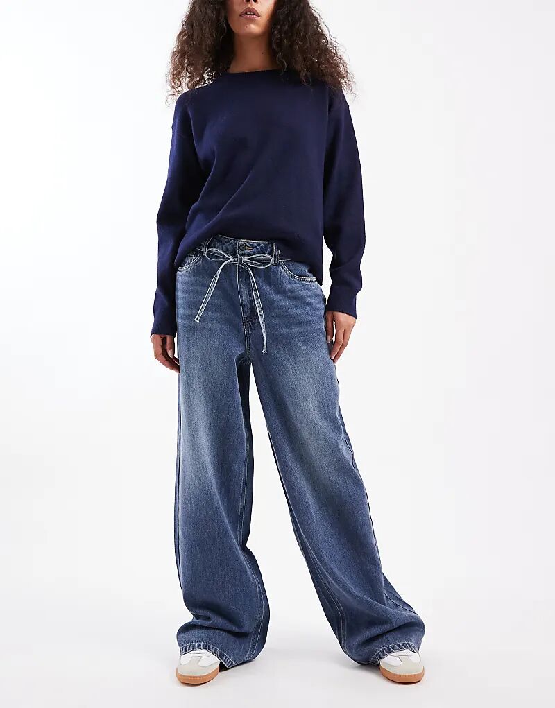 Джинсы с широкими штанинами и завязкой на талии, средне-синего цвета
Джинсы с широкими штанинами и завязкой на талии, средне-синего цвета