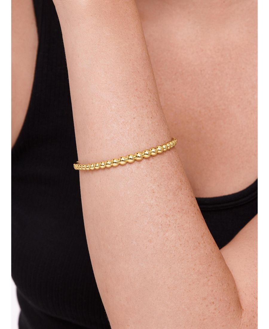 Браслет-манжета из позолоченного серебра с шариками, размер средний DEVATA, Gold
Браслет-манжета из позолоченного серебра с шариками, размер средний DEVATA, Gold