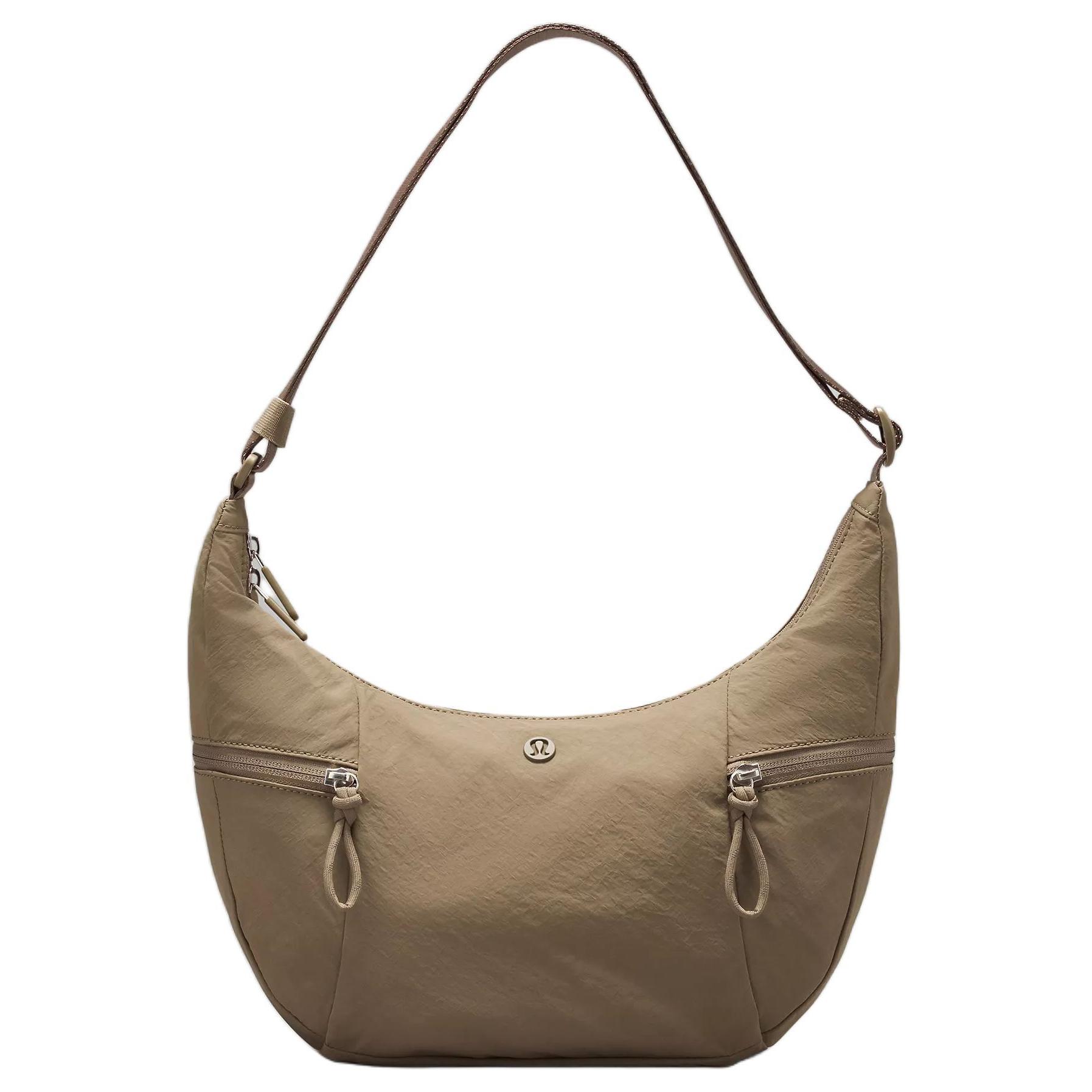 Lululemon Переработанный нейлоновый рюкзак через плечо унисекс светло-коричневый, Light Umber
Lululemon Переработанный нейлоновый рюкзак через плечо унисекс светло-коричневый, Light Umber