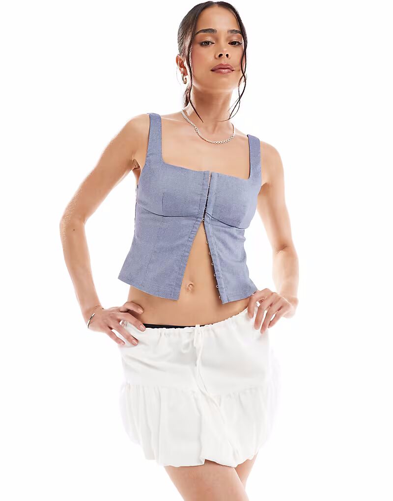 Мини-юбка Stradivarius STR с оборками белого цвета
Мини-юбка Stradivarius STR с оборками белого цвета