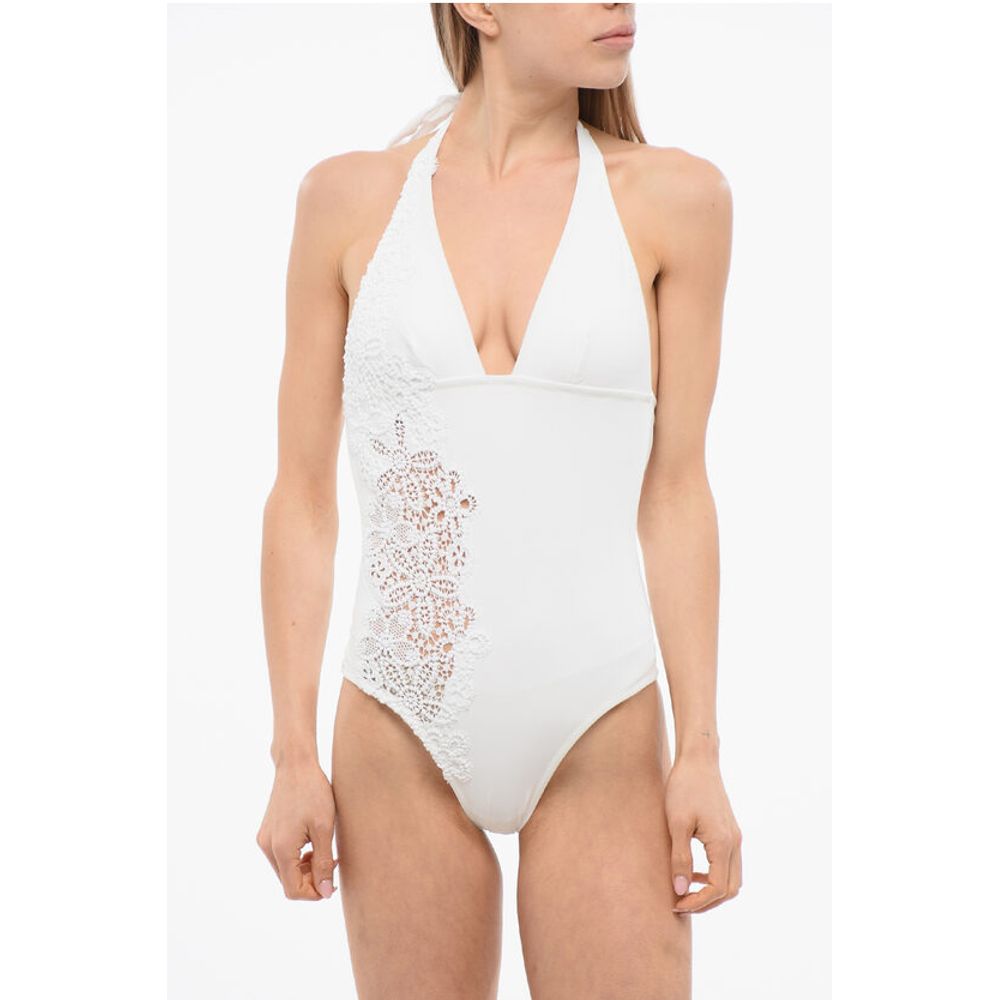 Слитный купальник однотонного цвета с открытой спиной и кружевными вставками по бокам Ermanno Scervino, White
Слитный купальник однотонного цвета с открытой спиной и кружевными вставками по бокам Ermanno Scervino, White