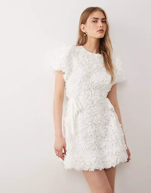 Белое мини-платье из тюля с цветочным принтом Dream Sister Jane Bridal Petalscape
Белое мини-платье из тюля с цветочным принтом Dream Sister Jane Bridal Petalscape