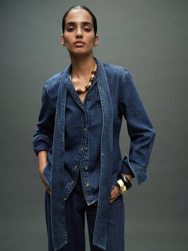 Джинсовая рубашка с бантом на воротнике Mango
Джинсовая рубашка с бантом на воротнике Mango