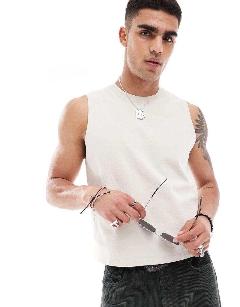 Тяжелая укороченная майка каменного цвета ASOS DESIGN
Тяжелая укороченная майка каменного цвета ASOS DESIGN