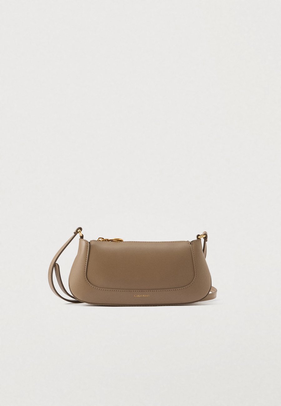 Сумка кросс-боди Calvin Klein ENGRAVED, Desert Taupe/Taupe
Сумка кросс-боди Calvin Klein ENGRAVED, Desert Taupe/Taupe