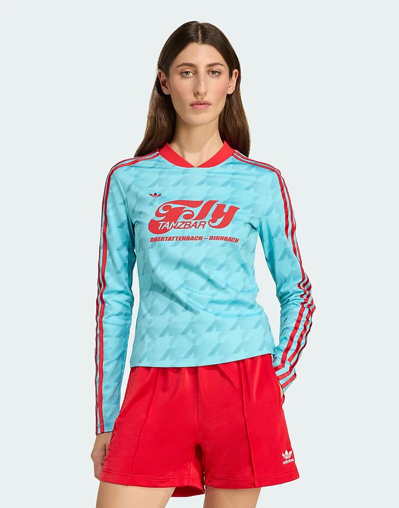 Лонгслив Adidas Originals Graphic Football с принтом по всей поверхности, облегающая, с длинными рукавами, в синем сиянии
Лонгслив Adidas Originals Graphic Football с принтом по всей поверхности, облегающая, с длинными рукавами, в синем сиянии