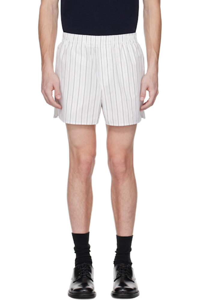 Бело-синие эластичные шорты AMI Paris
Бело-синие эластичные шорты AMI Paris