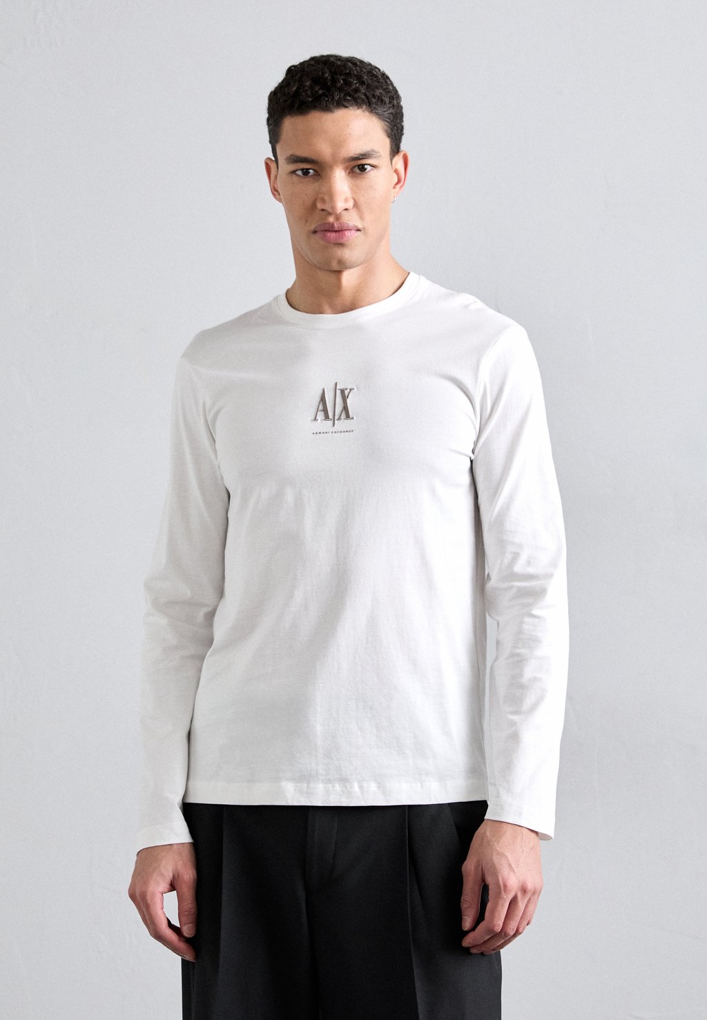 Топ с длинными рукавами Armani Exchange, молочный
Топ с длинными рукавами Armani Exchange, молочный