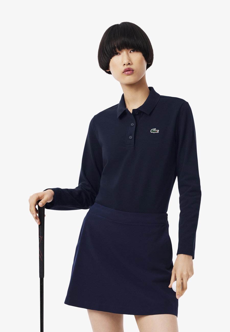 Поло Lacoste ML FEMME-PF, Bleu Nuit/Dark Blue
Поло Lacoste ML FEMME-PF, Bleu Nuit/Dark Blue