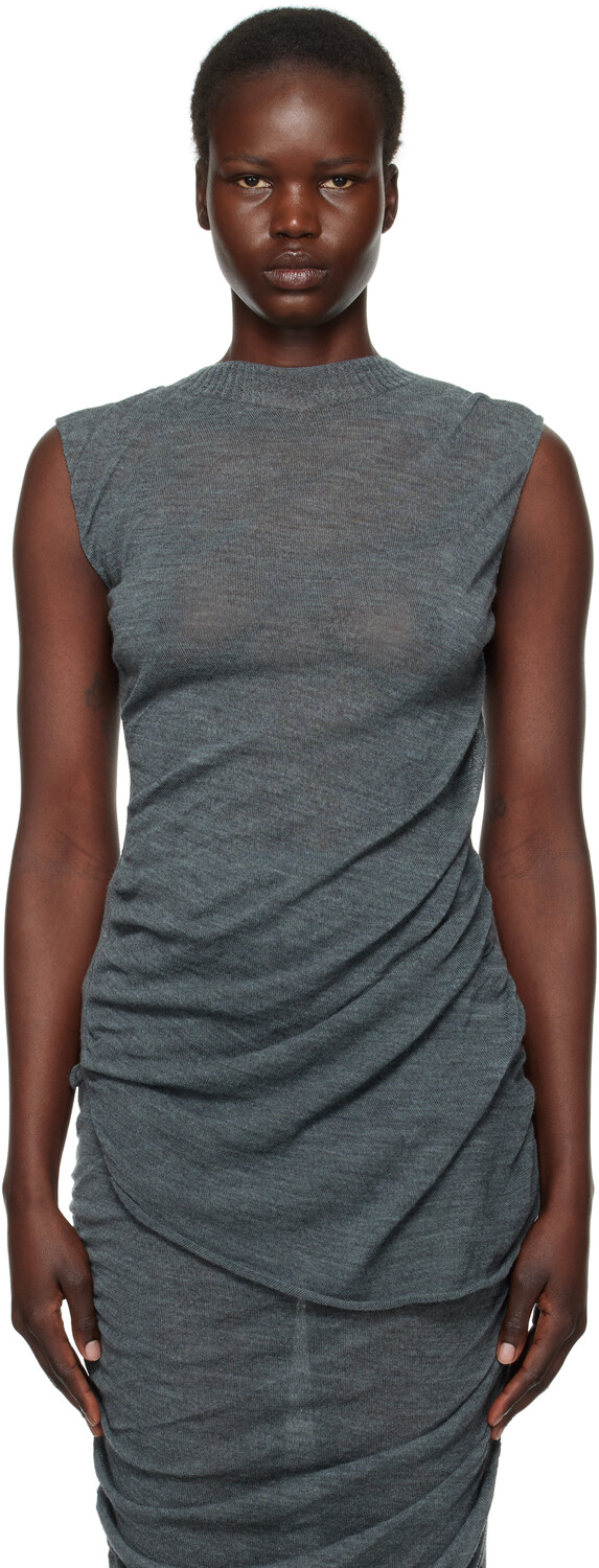 Серый неоднозначный шерстяной топ ISSEY MIYAKE
Серый неоднозначный шерстяной топ ISSEY MIYAKE