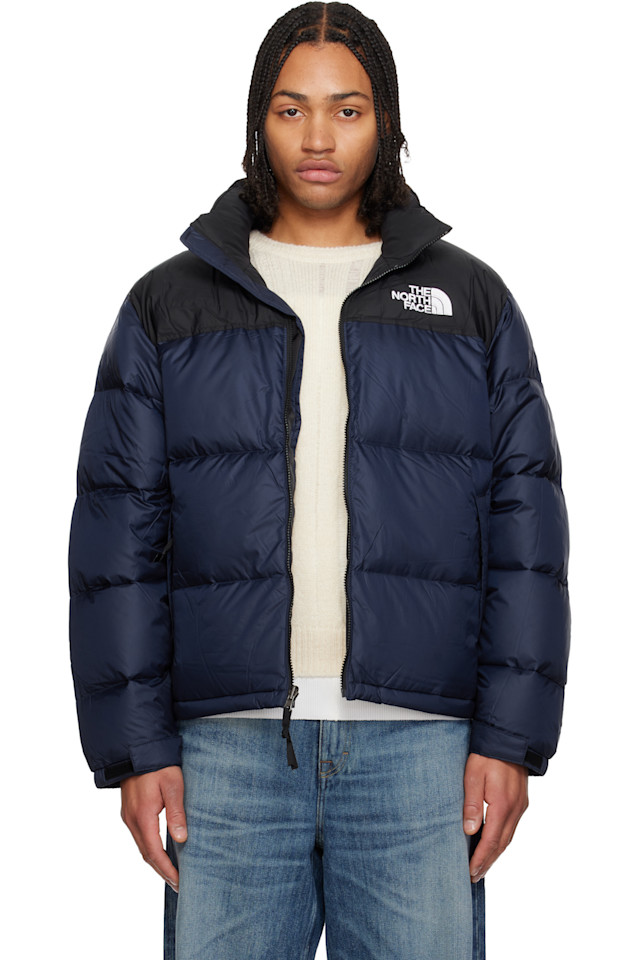 The North Face Пуховая куртка Nuptse в стиле ретро, темно-синего цвета, 1996 года
The North Face Пуховая куртка Nuptse в стиле ретро, темно-синего цвета, 1996 года