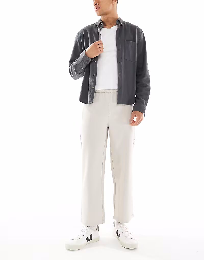 Брюки широкого кроя бежевого цвета Bershka
Брюки широкого кроя бежевого цвета Bershka