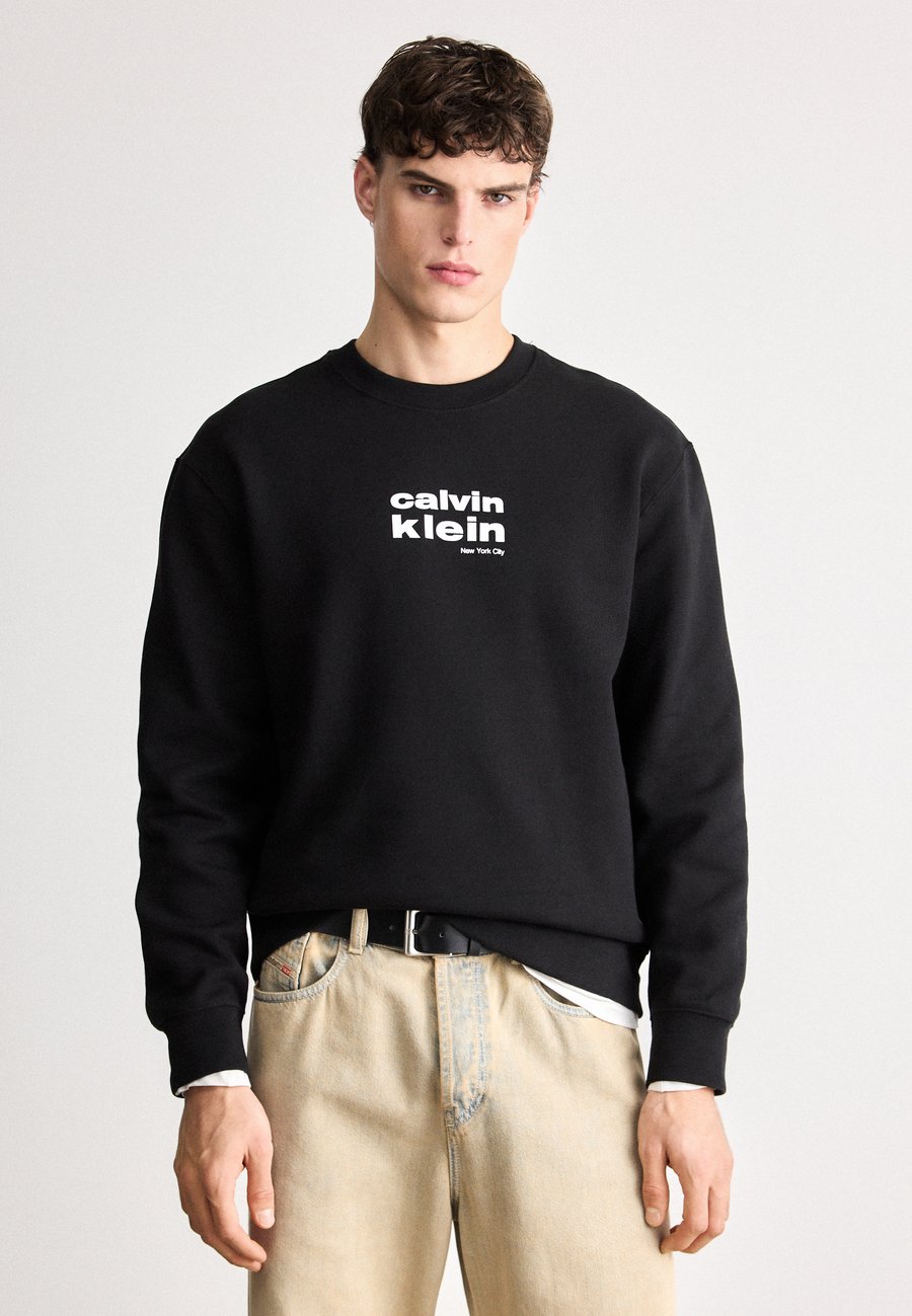 Толстовка Calvin Klein RETRO GRAPHIC CREW, Black, Черный, Толстовка Calvin Klein RETRO GRAPHIC CREW, Black
Толстовка Calvin Klein RETRO GRAPHIC CREW, Black, Черный, Толстовка Calvin Klein RETRO GRAPHIC CREW, Black