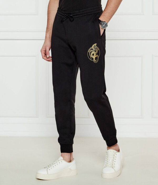 Спортивные штаны Armani Exchange хлопковые на кулиске, черный
Спортивные штаны Armani Exchange хлопковые на кулиске, черный