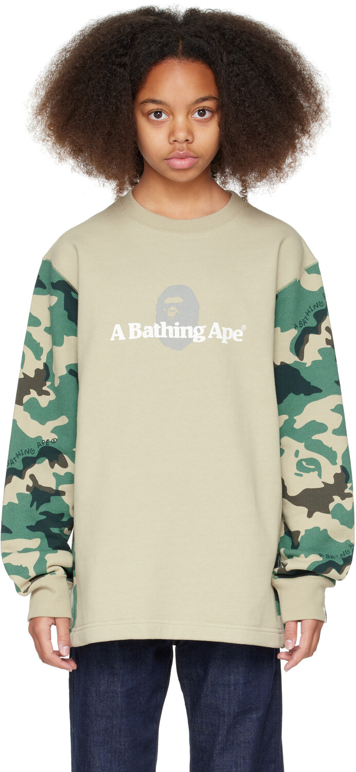 Детская бежевая толстовка Woodland Camo с круглым вырезом и цветными блоками BAPE
Детская бежевая толстовка Woodland Camo с круглым вырезом и цветными блоками BAPE