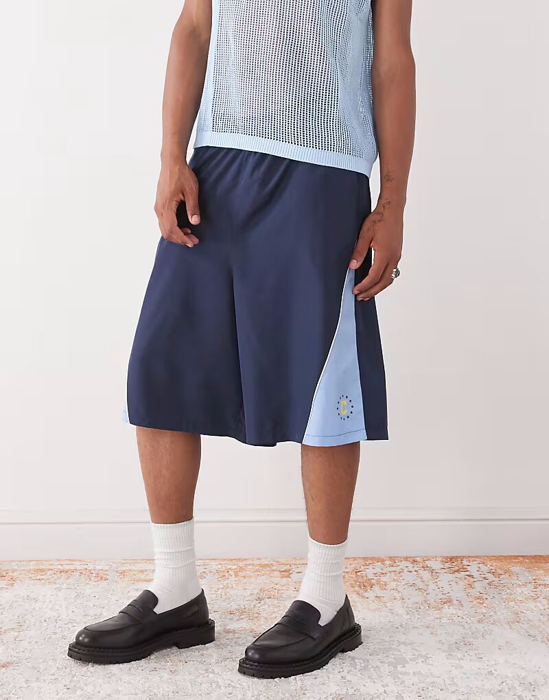 COLLUSION Шорты в футбольном стиле со вставками синего цвета
COLLUSION Шорты в футбольном стиле со вставками синего цвета