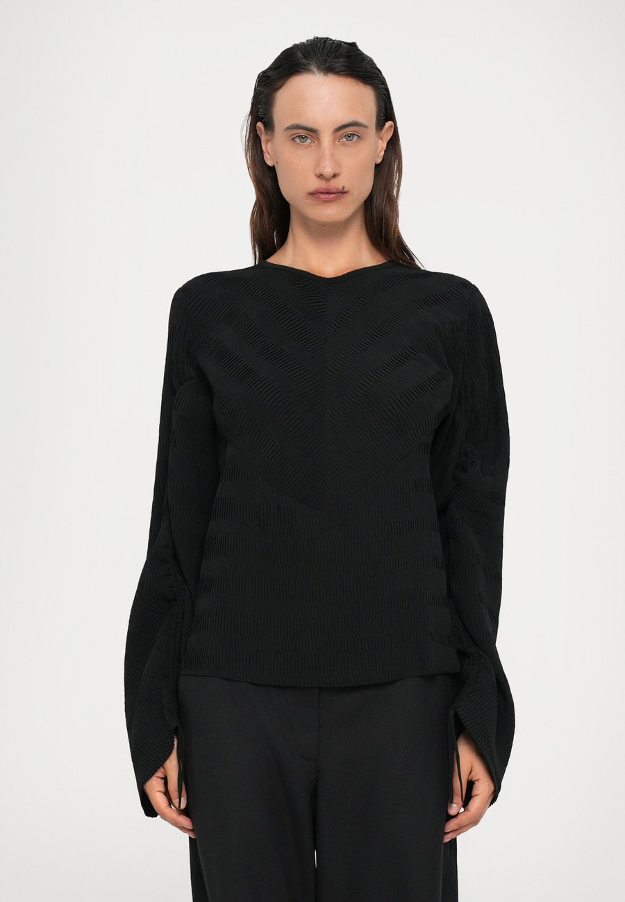 Блуза Henrik Vibskov WRINKLE, Black
Блуза Henrik Vibskov WRINKLE, Black