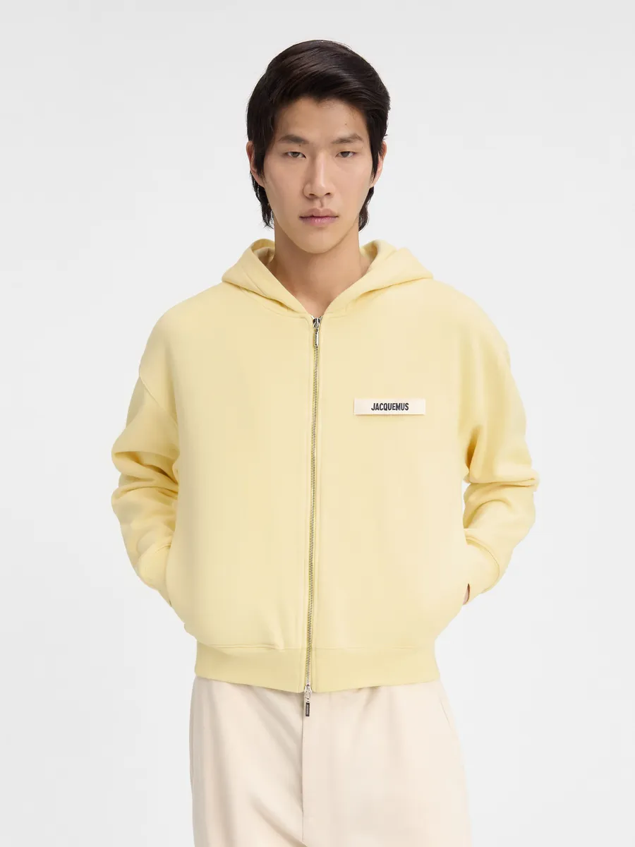 Толстовка на молнии с логотипом Grgrain Le Gr Grain Jacquemus, светло-желтый 
Толстовка на молнии с логотипом Grgrain Le Gr Grain Jacquemus, светло-желтый