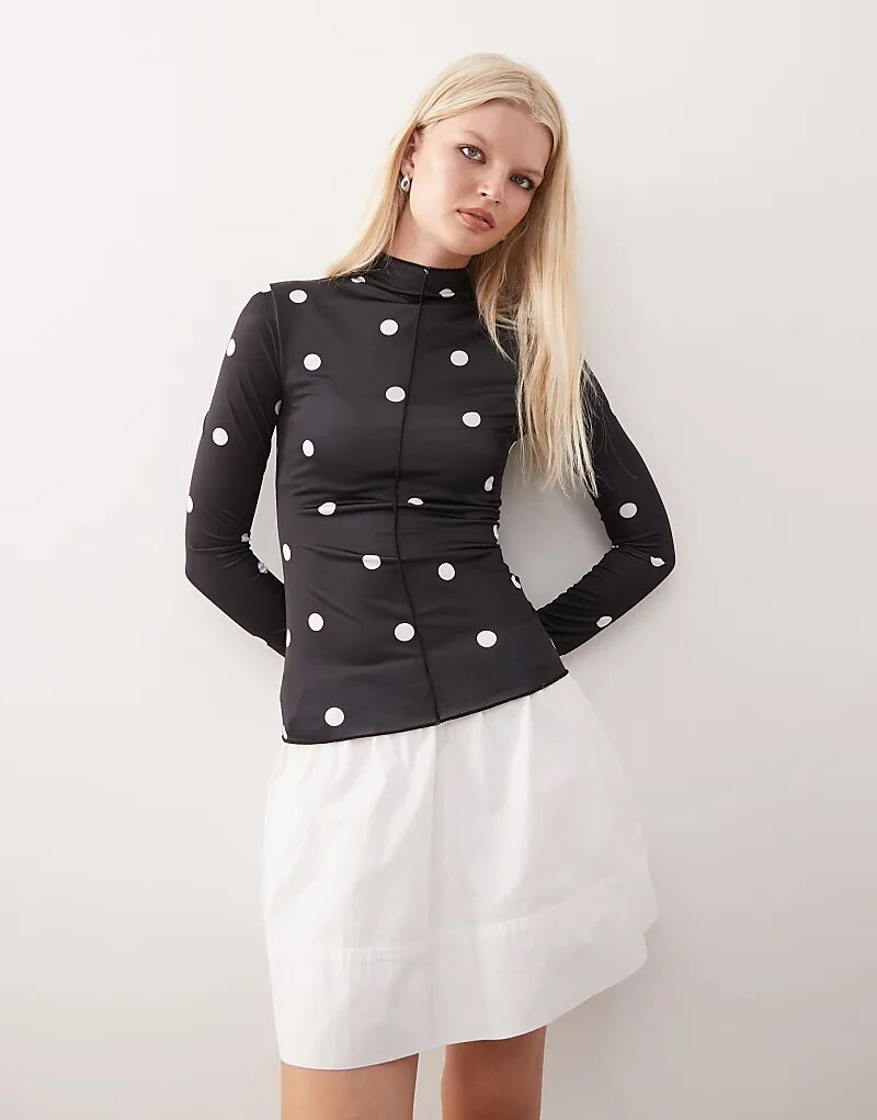 Лонгслив Monki с длинными рукавами и передним швом в черный горошек
Лонгслив Monki с длинными рукавами и передним швом в черный горошек