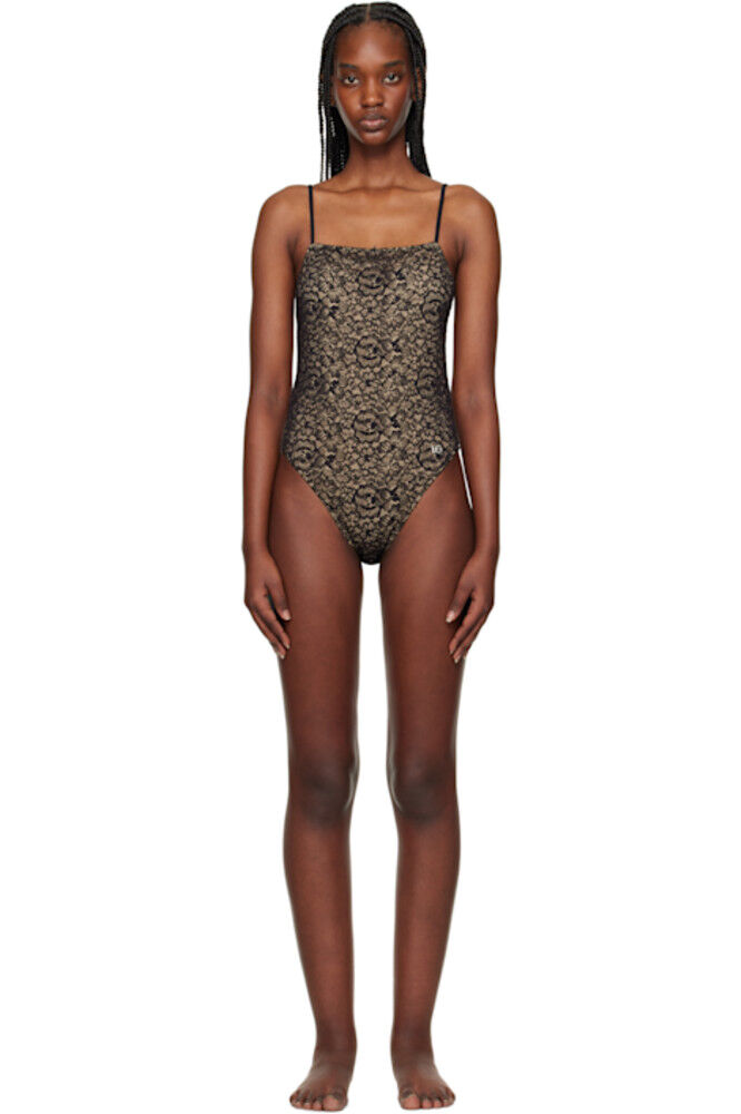 Купальник из бежевого и черного кружева Dolce&Gabbana
Купальник из бежевого и черного кружева Dolce&Gabbana