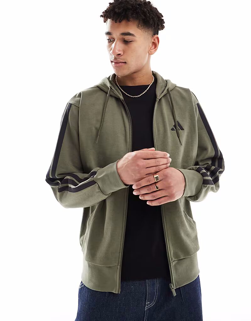 Толстовка с капюшоном Adidas Essentials с тремя полосками и застежкой-молнией из французского трикотажа в оливковом цвете/черном цвете Adidas Performance
Толстовка с капюшоном Adidas Essentials с тремя полосками и застежкой-молнией из французского трикотажа в оливковом цвете/черном цвете Adidas Performance