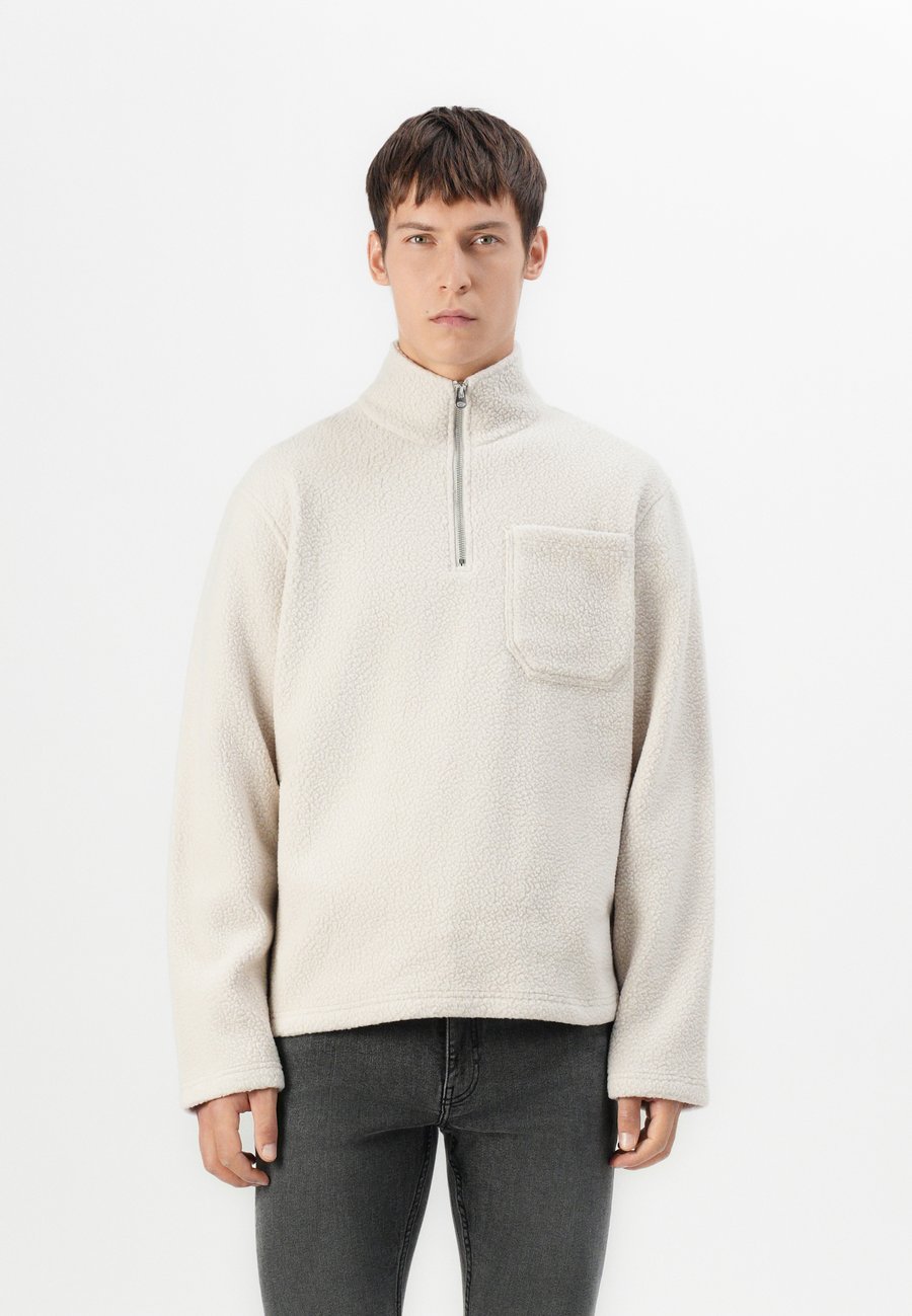 Джемпер Jack & Jones JORIBIZA HALF ZIP, Moonbeam/Off-White
Джемпер Jack & Jones JORIBIZA HALF ZIP, Moonbeam/Off-White