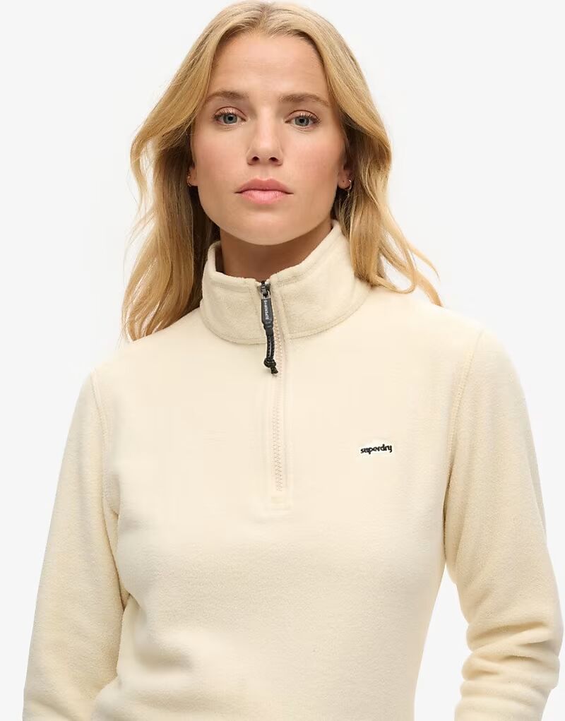 Джемпер Superdry Polar из флиса с застежкой-молнией на половину длины в овсяно-бежевом цвете
Джемпер Superdry Polar из флиса с застежкой-молнией на половину длины в овсяно-бежевом цвете