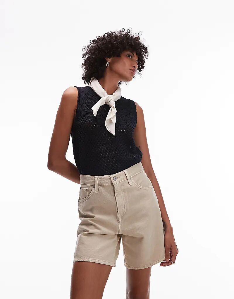 Высокие мешковатые джинсовые шорты Levi's цвета экрю
Высокие мешковатые джинсовые шорты Levi's цвета экрю