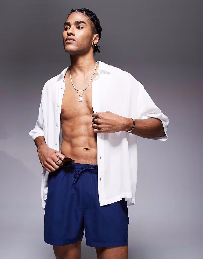 Короткие шорты для плавания ASOS DESIGN темно-синего цвета
Короткие шорты для плавания ASOS DESIGN темно-синего цвета