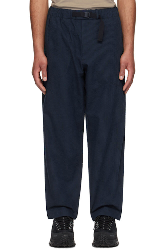 Брюки из ткани сирсакер с поясом темно-синего цвета Moncler
Брюки из ткани сирсакер с поясом темно-синего цвета Moncler