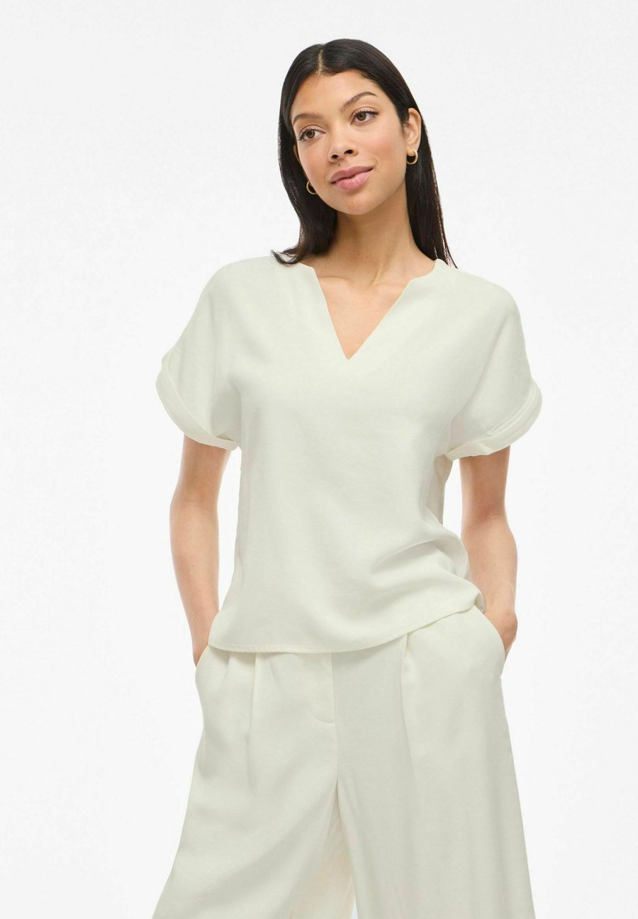 Блуза VILA MIT KURZEN ÄRMELN VIMARLEE SPLIT NECK, Birch/White
Блуза VILA MIT KURZEN ÄRMELN VIMARLEE SPLIT NECK, Birch/White