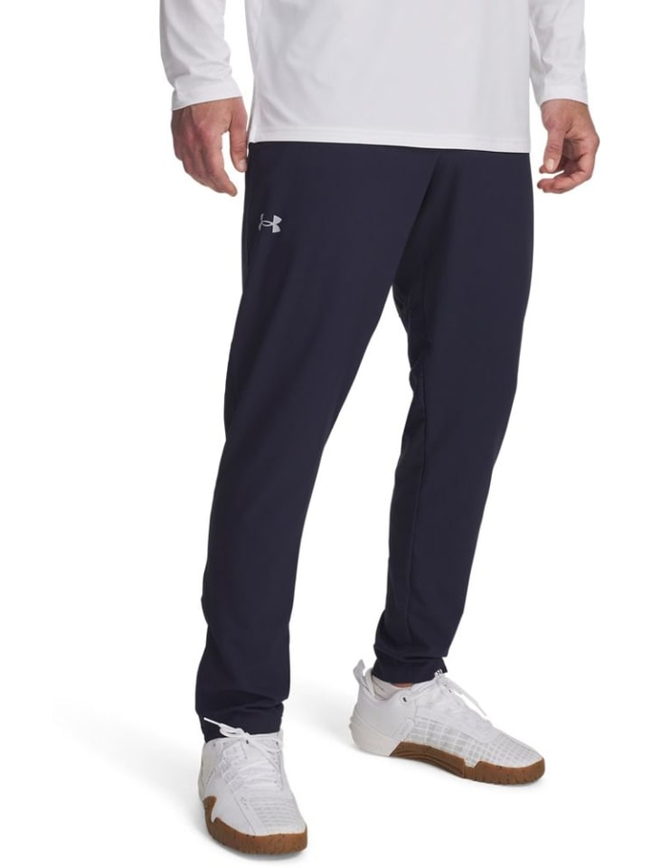 Спортивные брюки Vanish Woven Tapered Pants синего цвета Under Armour
Спортивные брюки Vanish Woven Tapered Pants синего цвета Under Armour