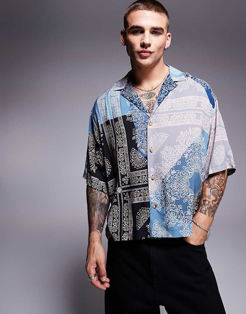 Синяя рубашка свободного кроя ASOS DESIGN с широким воротником с лацканами и разрезной банданой
Синяя рубашка свободного кроя ASOS DESIGN с широким воротником с лацканами и разрезной банданой