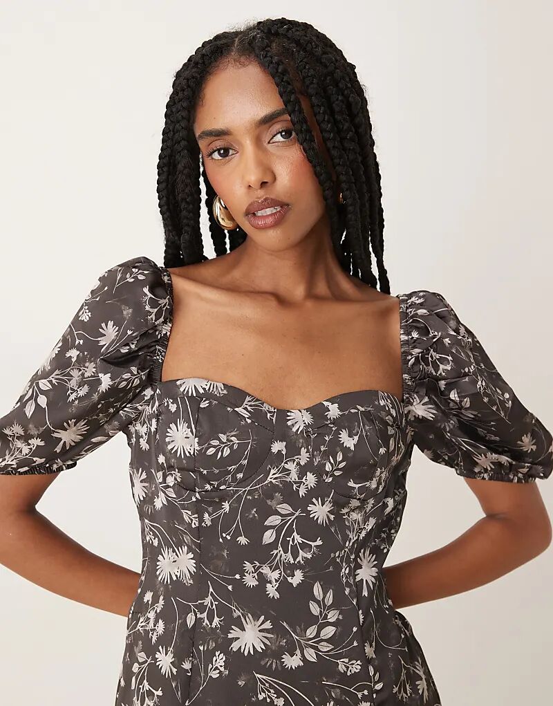 Мини-платье Milkmaid от Collective The Label с коричневым цветочным принтом
Мини-платье Milkmaid от Collective The Label с коричневым цветочным принтом