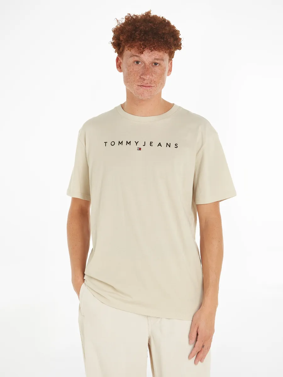Футболка Tommy Jeans "TJM REG LINEAR LOGO TEE EXT" с фирменной этикеткой, цвет Newsprint
Футболка Tommy Jeans "TJM REG LINEAR LOGO TEE EXT" с фирменной этикеткой, цвет Newsprint