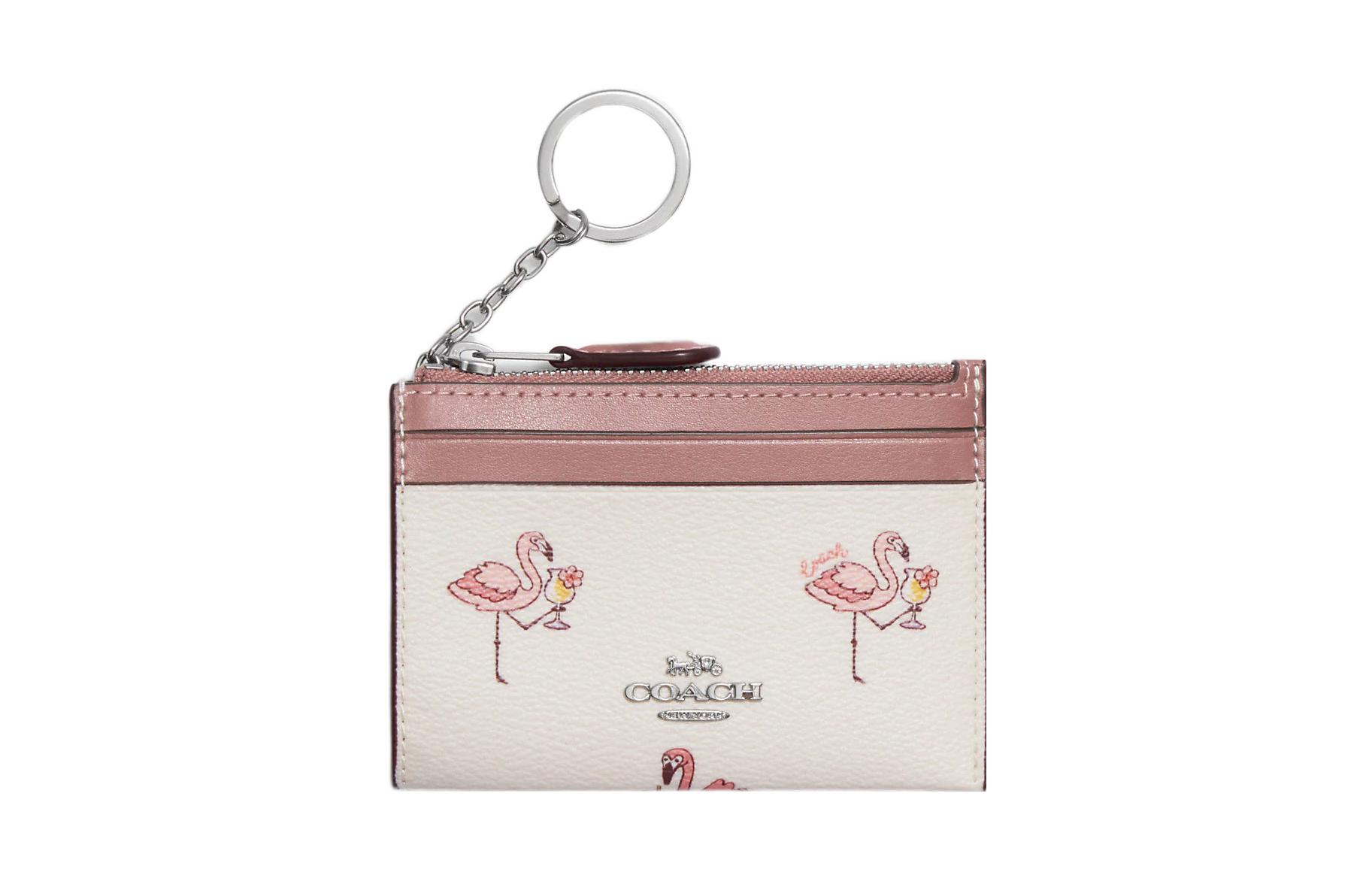COACH Узкий чехол для айди с кожаными карманами и монетницей в светлорозовом цвете
COACH Узкий чехол для айди с кожаными карманами и монетницей в светлорозовом цвете