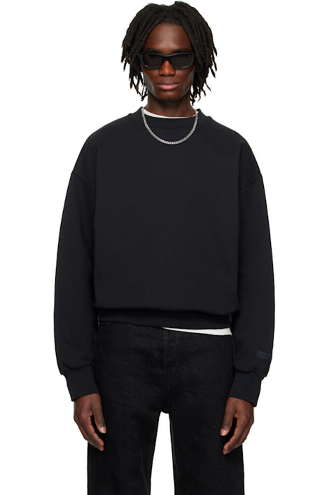 Черная классическая толстовка с круглым вырезом Fear of God ESSENTIALS
Черная классическая толстовка с круглым вырезом Fear of God ESSENTIALS