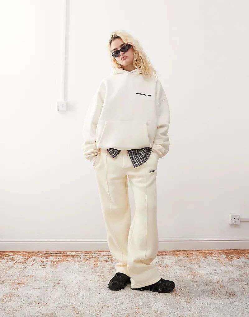 Джоггеры прямого кроя с логотипом в кремовом цвете Prohibited
Джоггеры прямого кроя с логотипом в кремовом цвете Prohibited