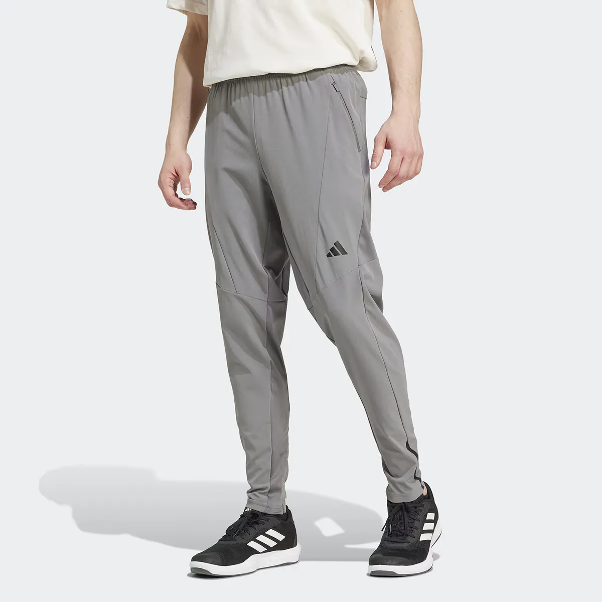 Мужские предназначенные для тренировок гибридные брюки Adidas, серый
Мужские предназначенные для тренировок гибридные брюки Adidas, серый