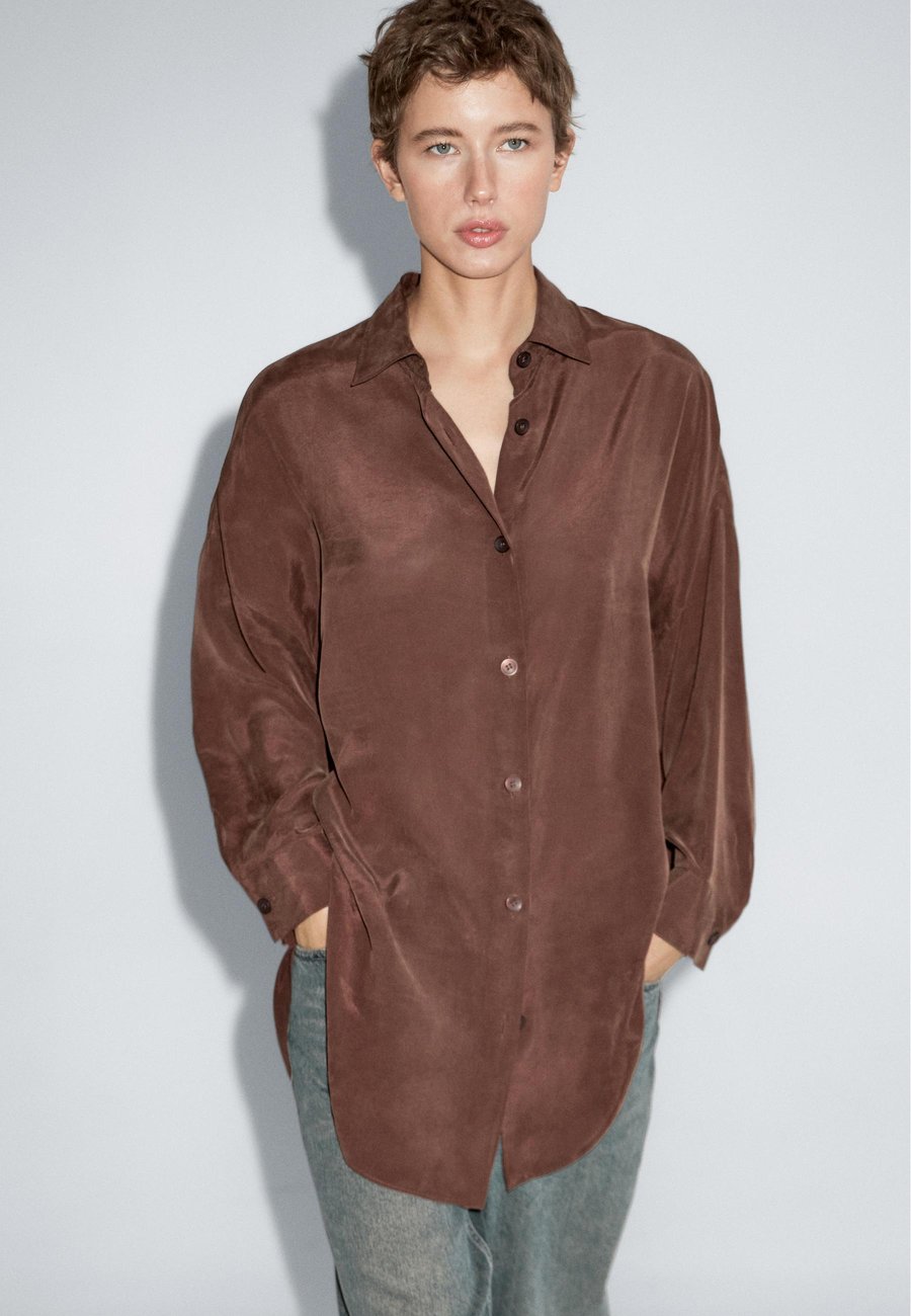 Блуза Massimo Dutti LONG FLOWING , Dark Brown
Блуза Massimo Dutti LONG FLOWING , Dark Brown