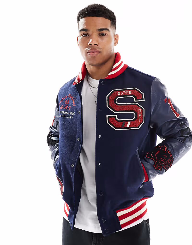 Куртка-бомбер с заплатками колледжа Superdry в цвете Atlantic Navy 2, Синий, Куртка-бомбер с заплатками колледжа Superdry в цвете Atlantic Navy 2
Куртка-бомбер с заплатками колледжа Superdry в цвете Atlantic Navy 2, Синий, Куртка-бомбер с заплатками колледжа Superdry в цвете Atlantic Navy 2