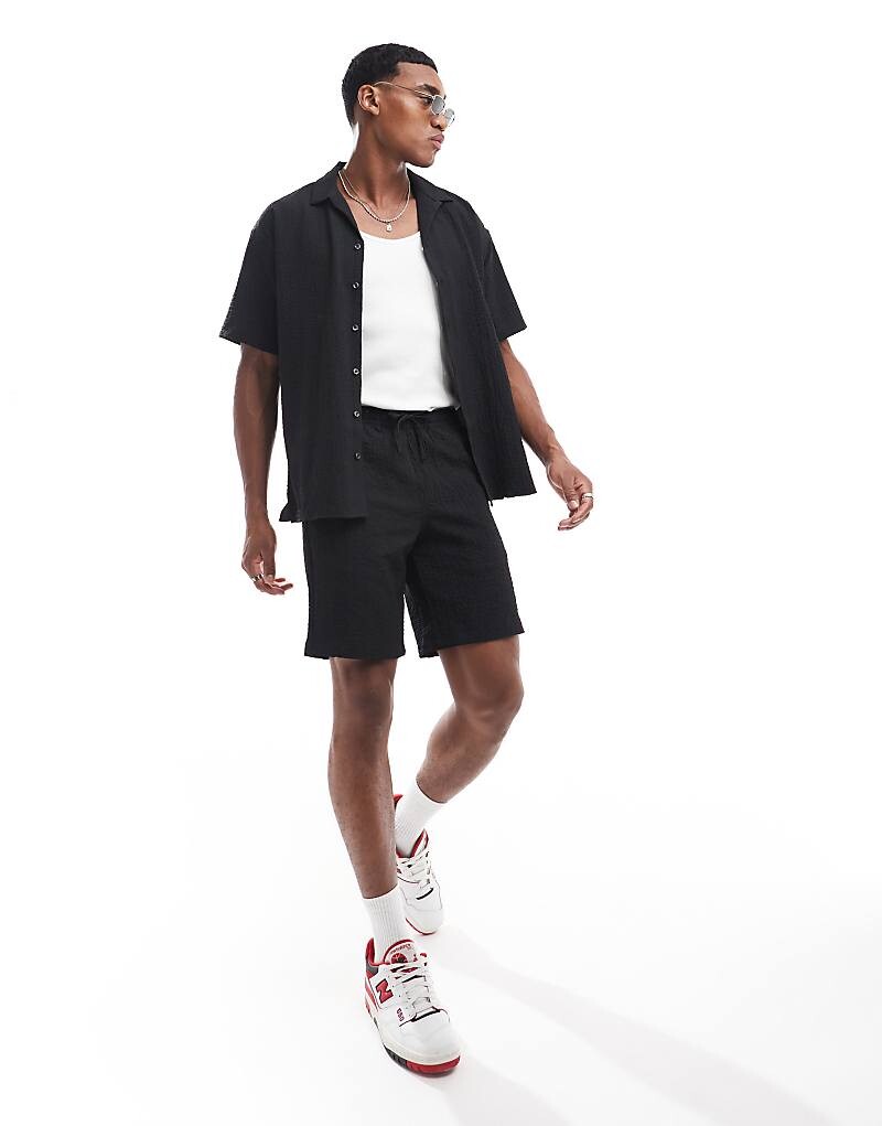 Черные шорты в жатом стиле Jack & Jones
Черные шорты в жатом стиле Jack & Jones