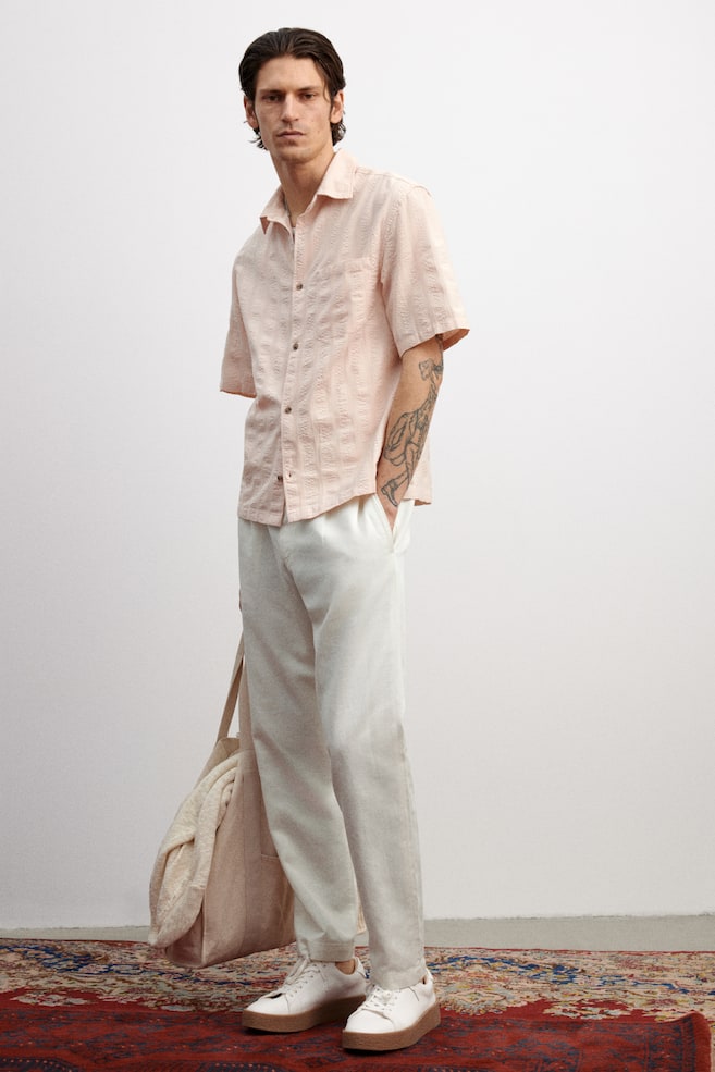 Брюки из лиоцелловой смеси, прямого кроя. H&M, белый
Брюки из лиоцелловой смеси, прямого кроя. H&M, белый