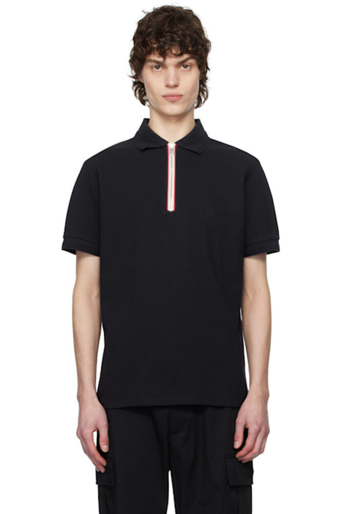 Поло из хлопка пике с отделкой в виде трехцветного синего цвета Moncler
Поло из хлопка пике с отделкой в виде трехцветного синего цвета Moncler