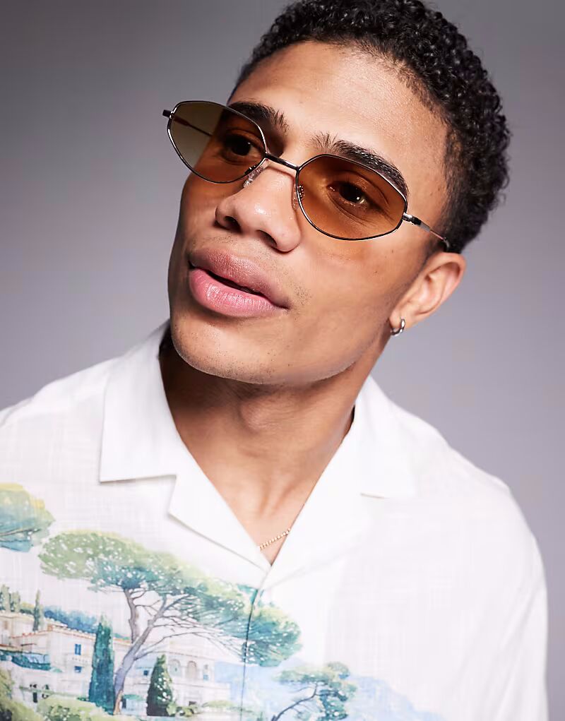 Солнцезащитные очки угловатой овальной формы из бледно-золотистого металла с коричневыми линзами Asos Design
Солнцезащитные очки угловатой овальной формы из бледно-золотистого металла с коричневыми линзами Asos Design