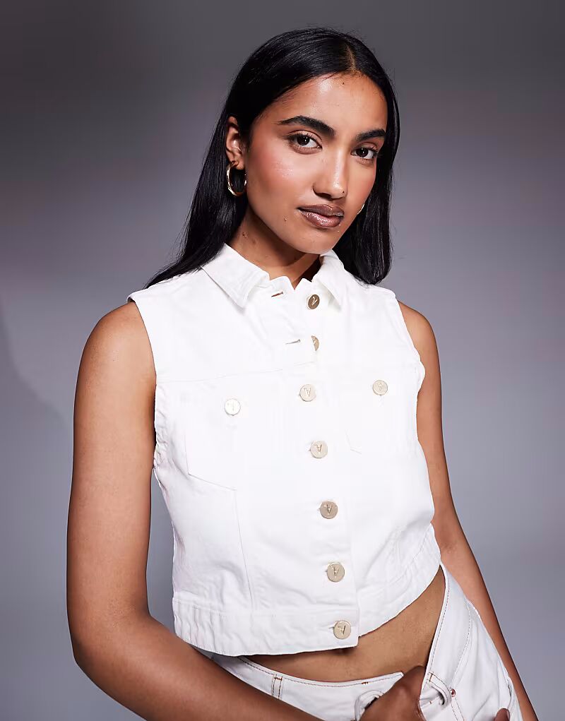 Джинсовый жилет Day Tripper белого цвета с пуговицами спереди Abrand Jeans
Джинсовый жилет Day Tripper белого цвета с пуговицами спереди Abrand Jeans