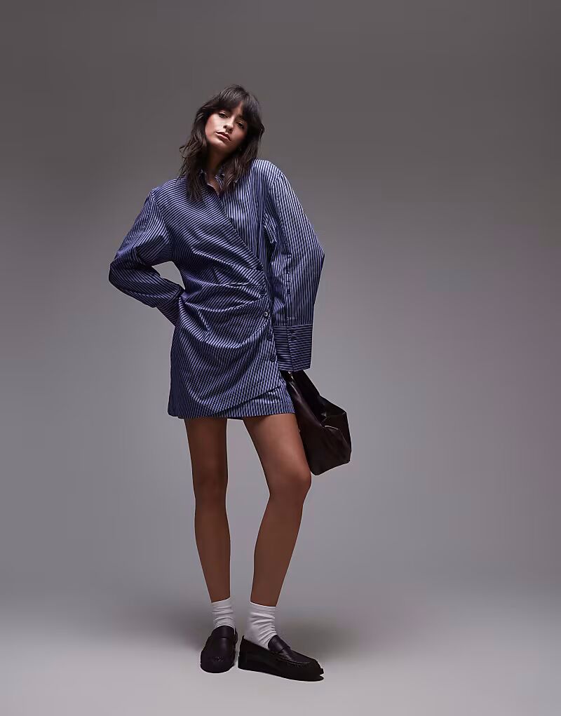 & Other Stories мини-платье-рубашка с рюшами спереди и запахом в синюю полоску
& Other Stories мини-платье-рубашка с рюшами спереди и запахом в синюю полоску