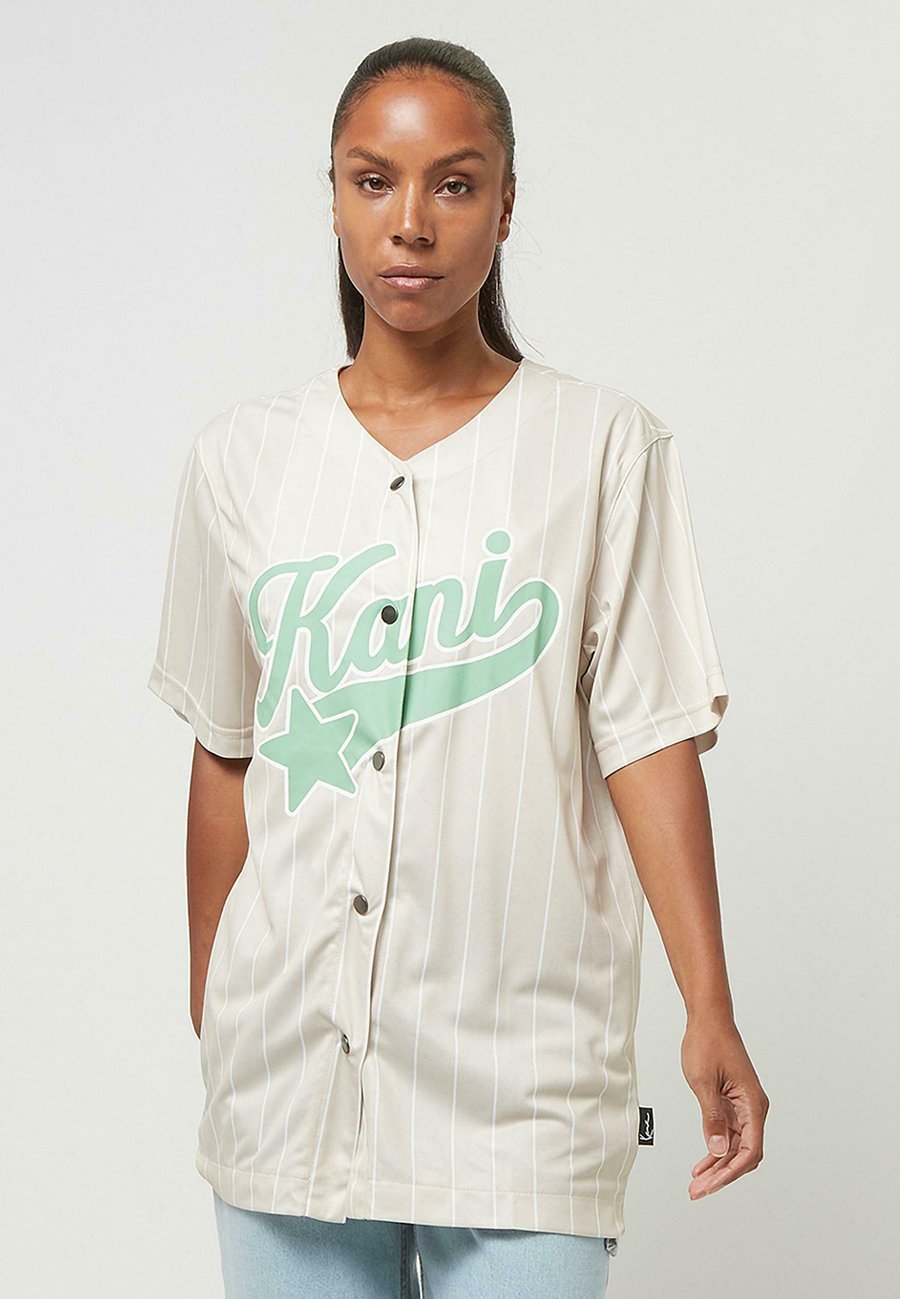Блуза Karl Kani SIGNATURE BASEBALL, Beige
Блуза Karl Kani SIGNATURE BASEBALL, Beige