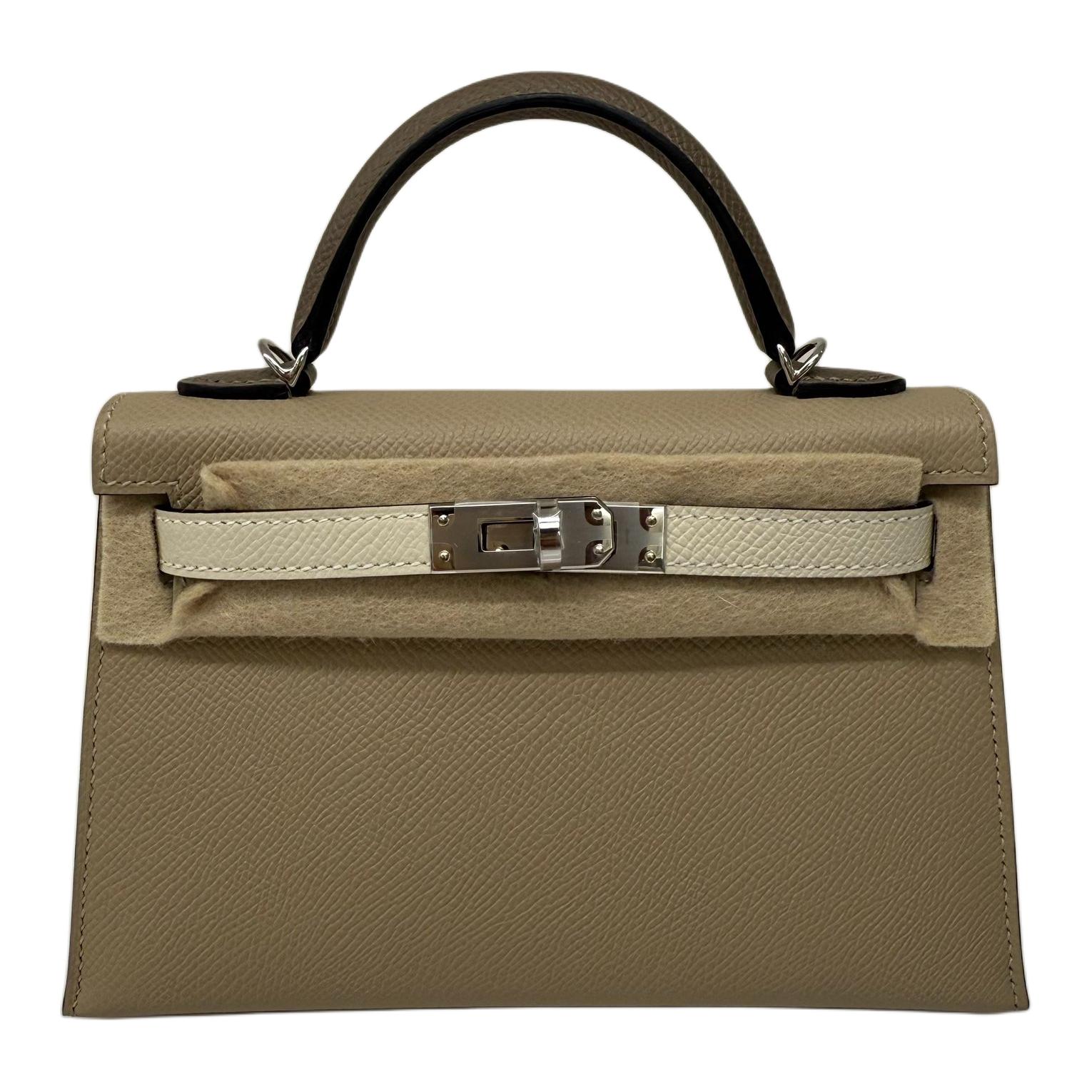 HERMES Мини келли второго поколения сумка мини женская из кожи эпсом trench gray, cream white и elephant gray
HERMES Мини келли второго поколения сумка мини женская из кожи эпсом trench gray, cream white и elephant gray